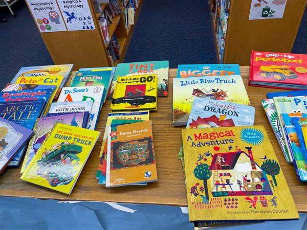 Free books were also part of the Holiday Shop display as parents and families could take books home to their kids.